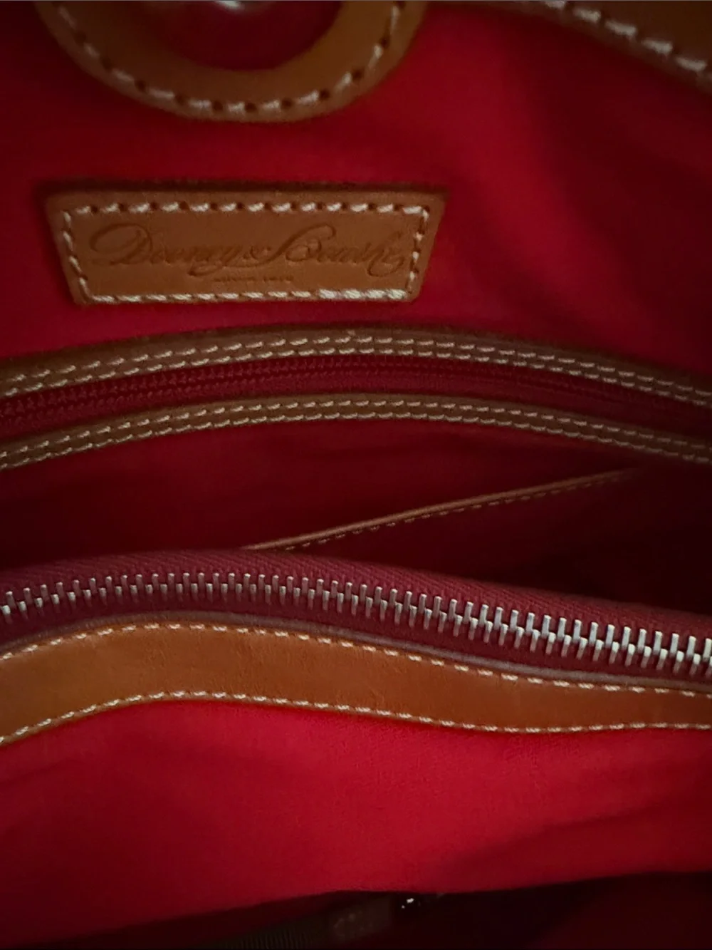 Dooney & Bourke Tote with Tan Leather Straps and Grommet Details